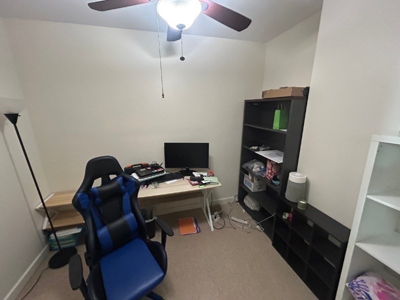 122 A Spring Street, Unit 3 Cambridge, MA 02141 - Photo 10 of 11 a view of a workspace with furniture and a window