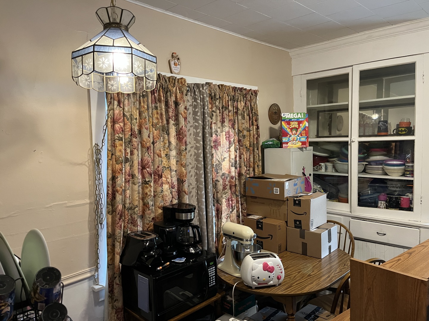 718 Plainfield Road Joliet, IL 60435 - Photo 11 of 28 a room with a workspace and a chandelier