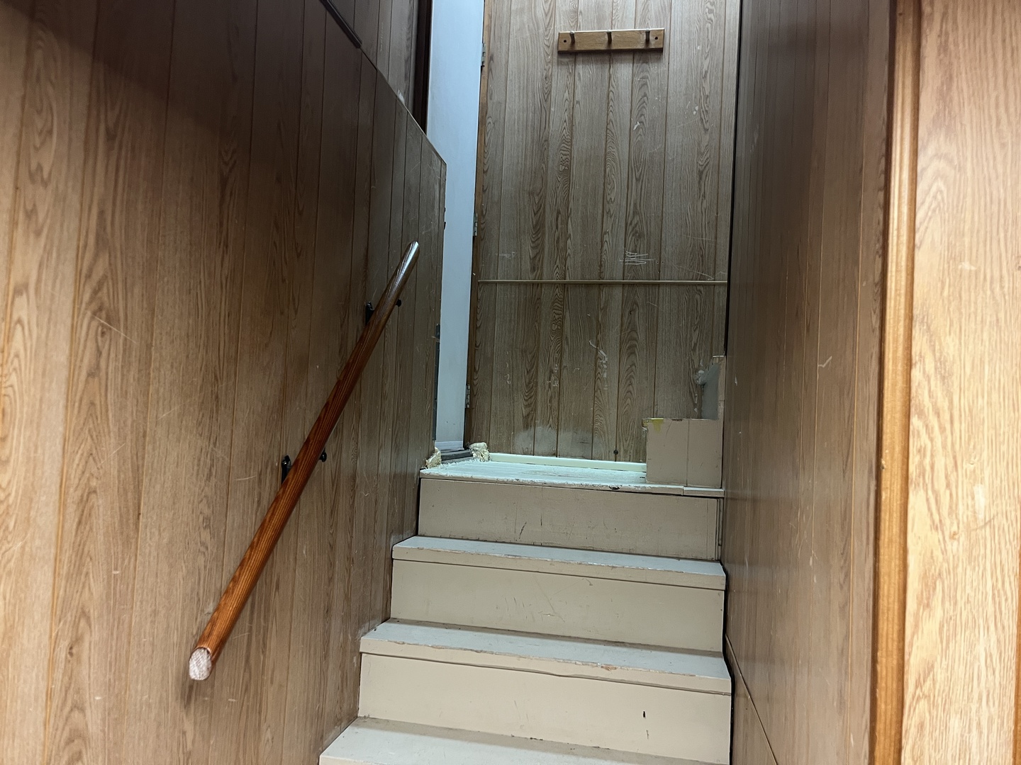 718 Plainfield Road Joliet, IL 60435 - Photo 22 of 28 a view of staircase with white walls and door