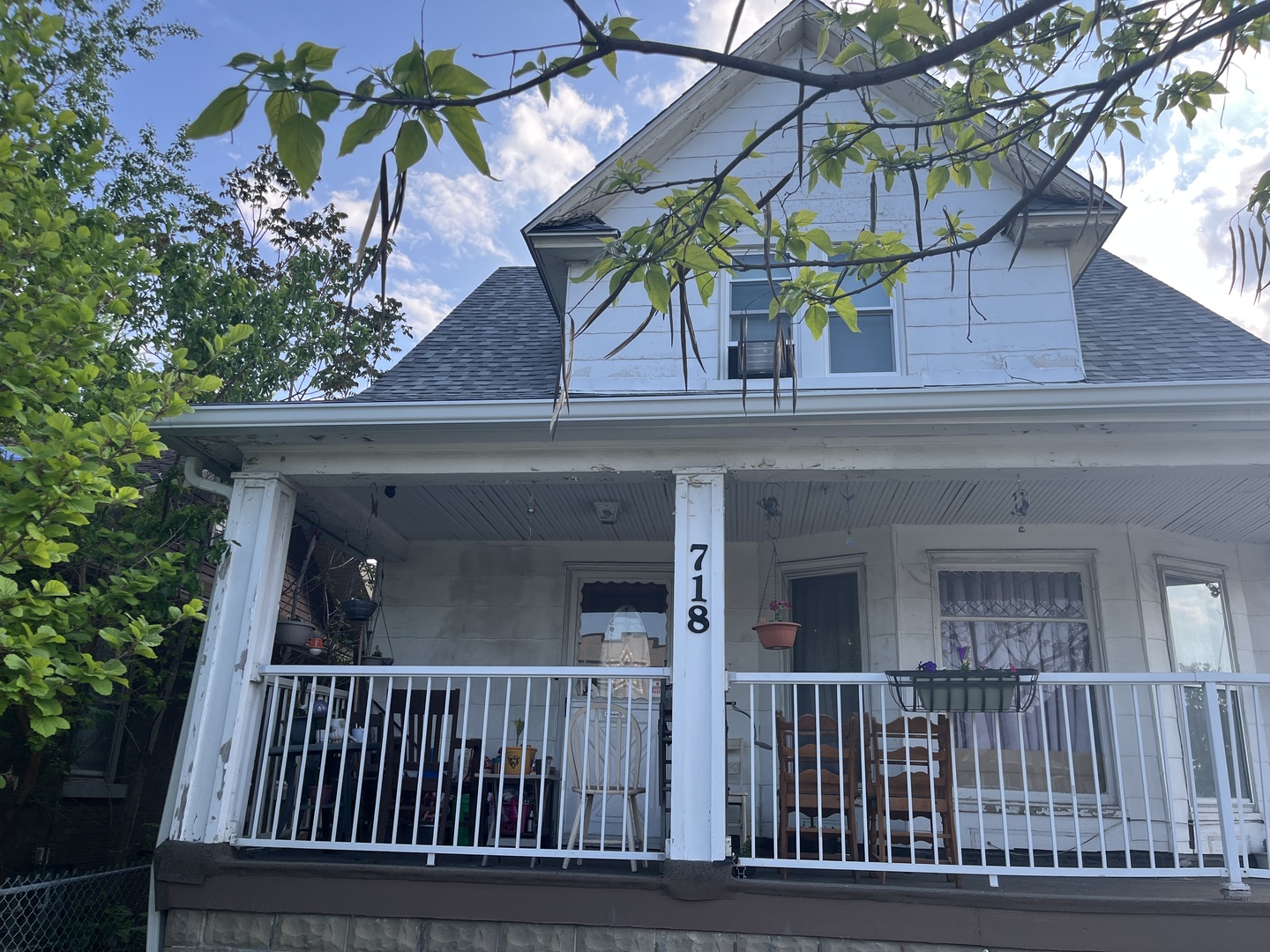 718 Plainfield Road Joliet, IL 60435 - Photo 3 of 28 a view of small house with a deck