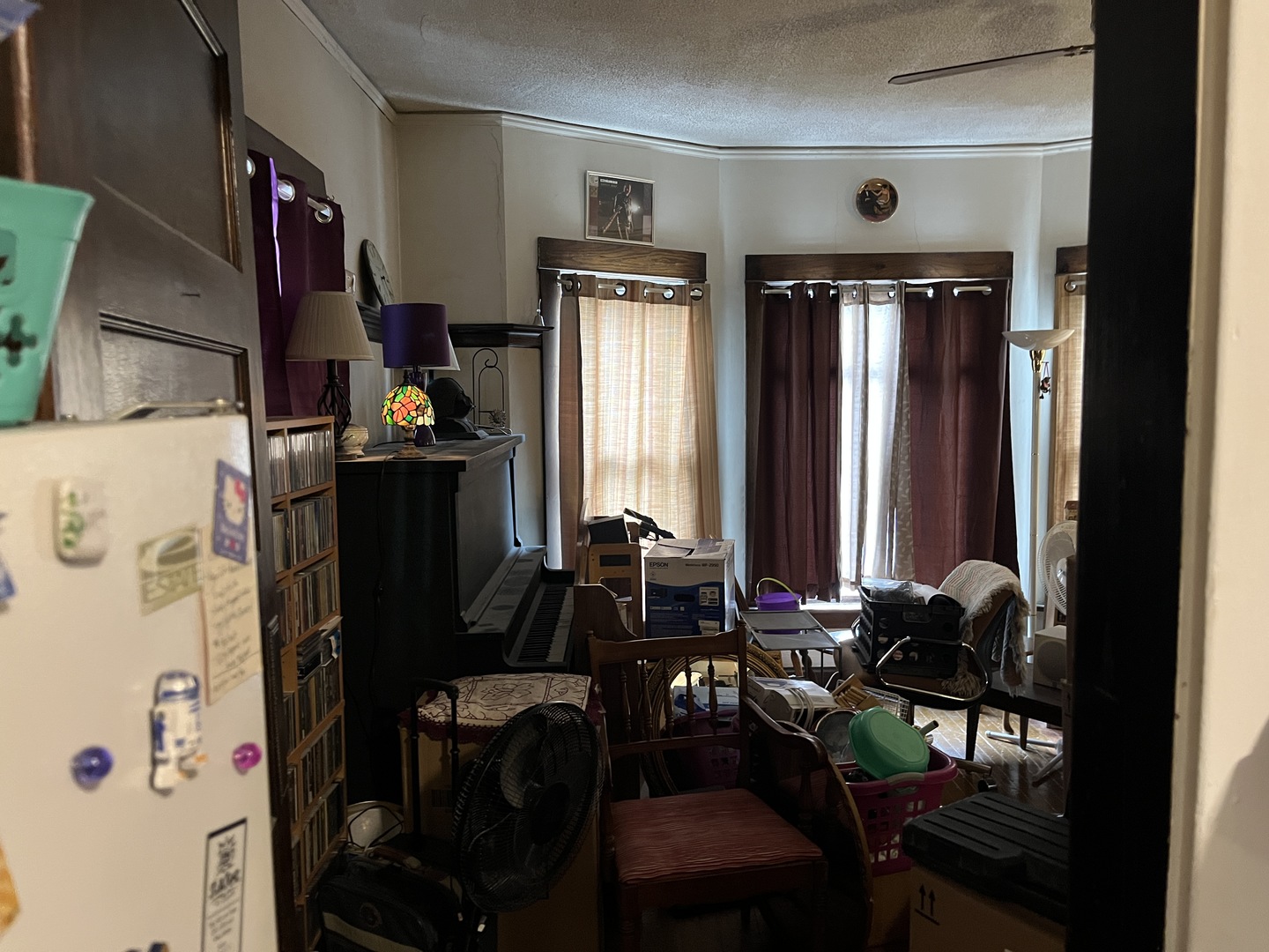 718 Plainfield Road Joliet, IL 60435 - Photo 10 of 28 a room with furniture and wooden floor