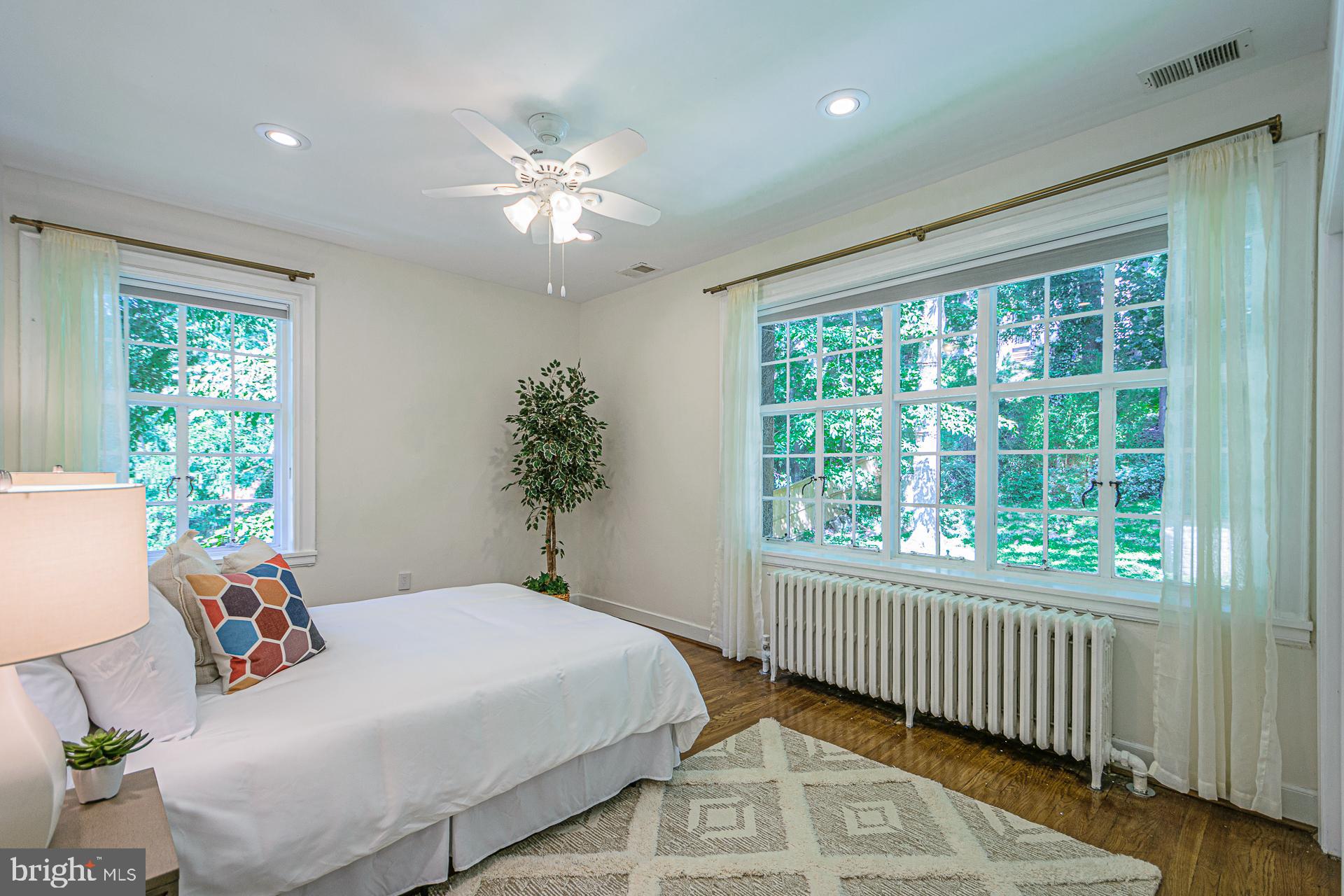 4331 Blagden Avenue Northwest Washington, DC 20011 - Photo 28 of 38 a bedroom with a bed and a window