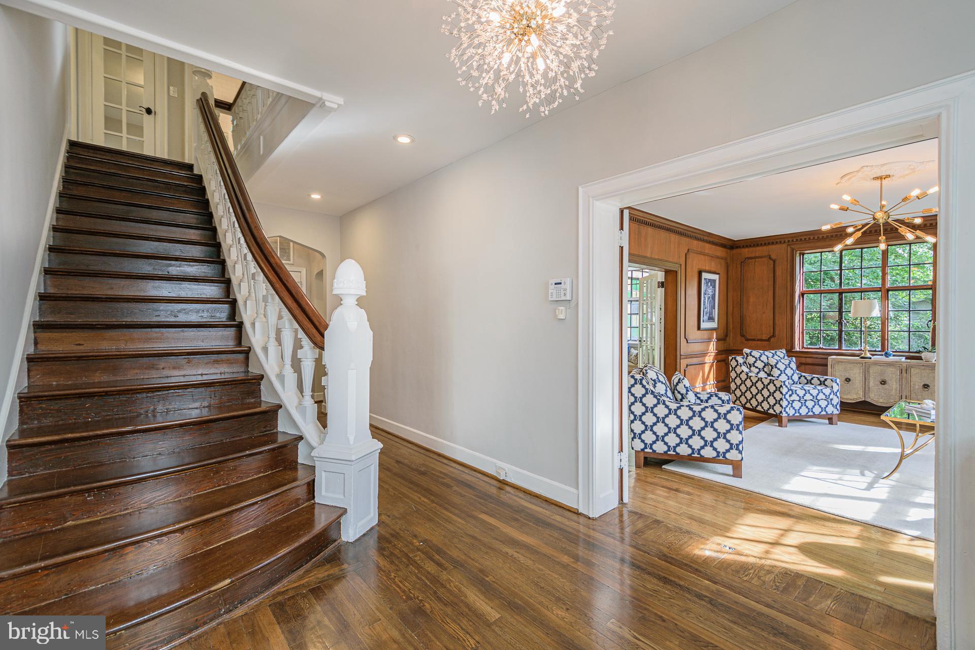4331 Blagden Avenue Northwest Washington, DC 20011 - Photo 10 of 38 a view of a livingroom with wooden floor and stairs