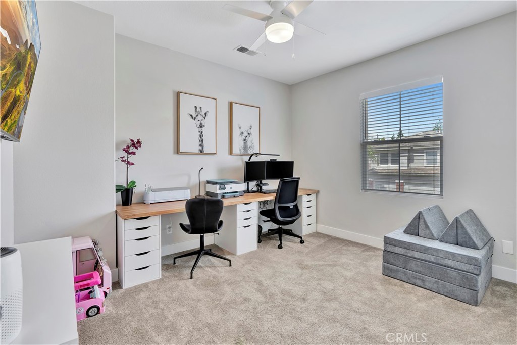 412 Mackena Place Placentia, CA 92870 - Photo 13 of 42 a livingroom with a workspace