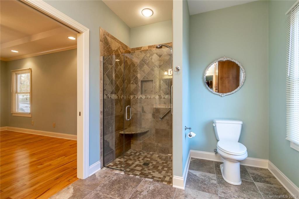 170 Towhee Trail Tryon, NC 28782 - Photo 22 of 38 a bathroom with a toilet and a shower