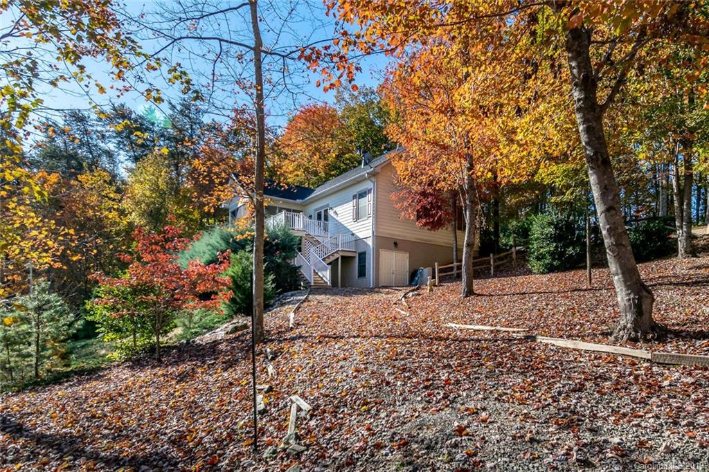 170 Towhee Trail Tryon, NC 28782 - Photo 4 of 38 a house with a tree in the background