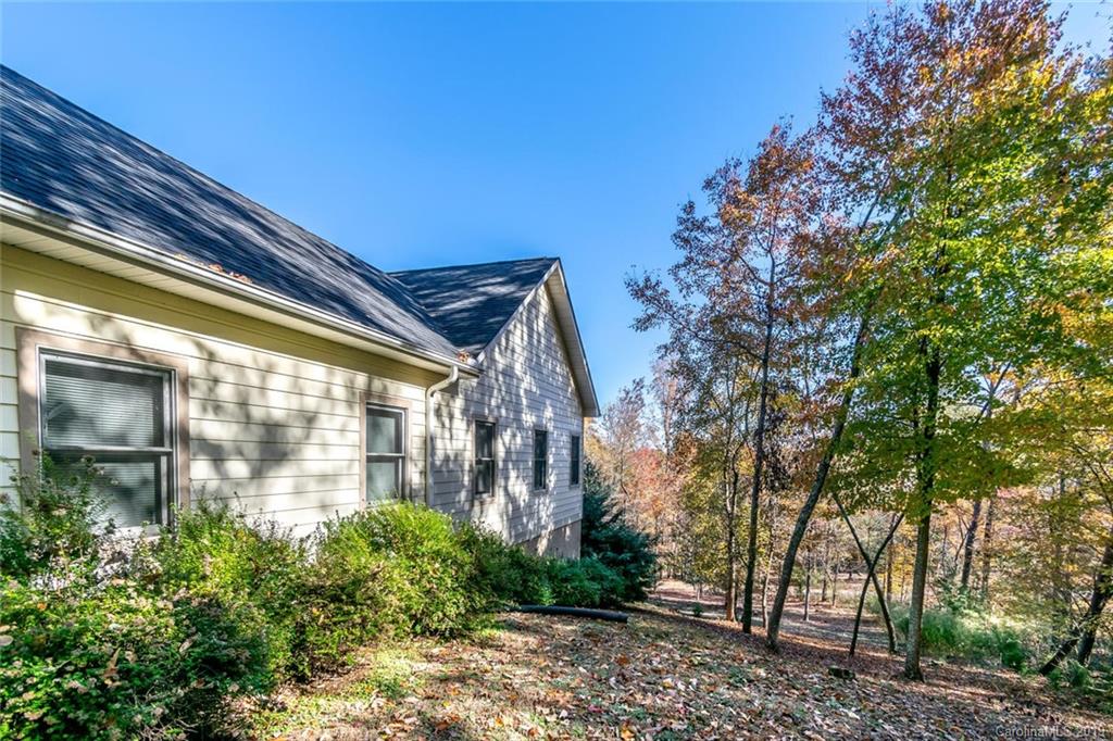 170 Towhee Trail Tryon, NC 28782 - Photo 36 of 38 a front view of a house with garden