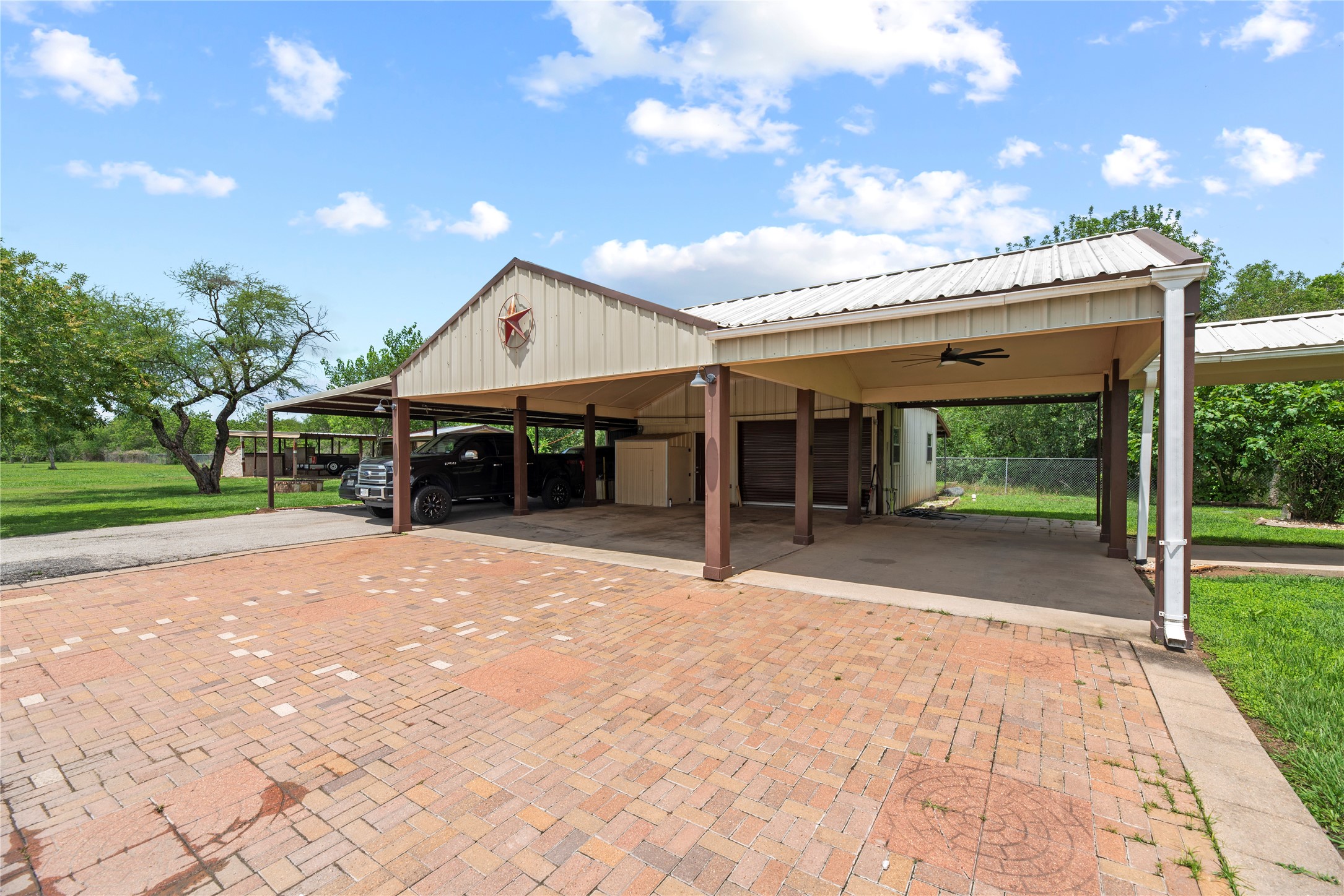 523 Moore Bar Road Rosenberg, TX 77471 - Photo 7 of 50 There is a partially converted 2 car garage (currently a single car garage). Ample covered parking for 8+ vehicles.