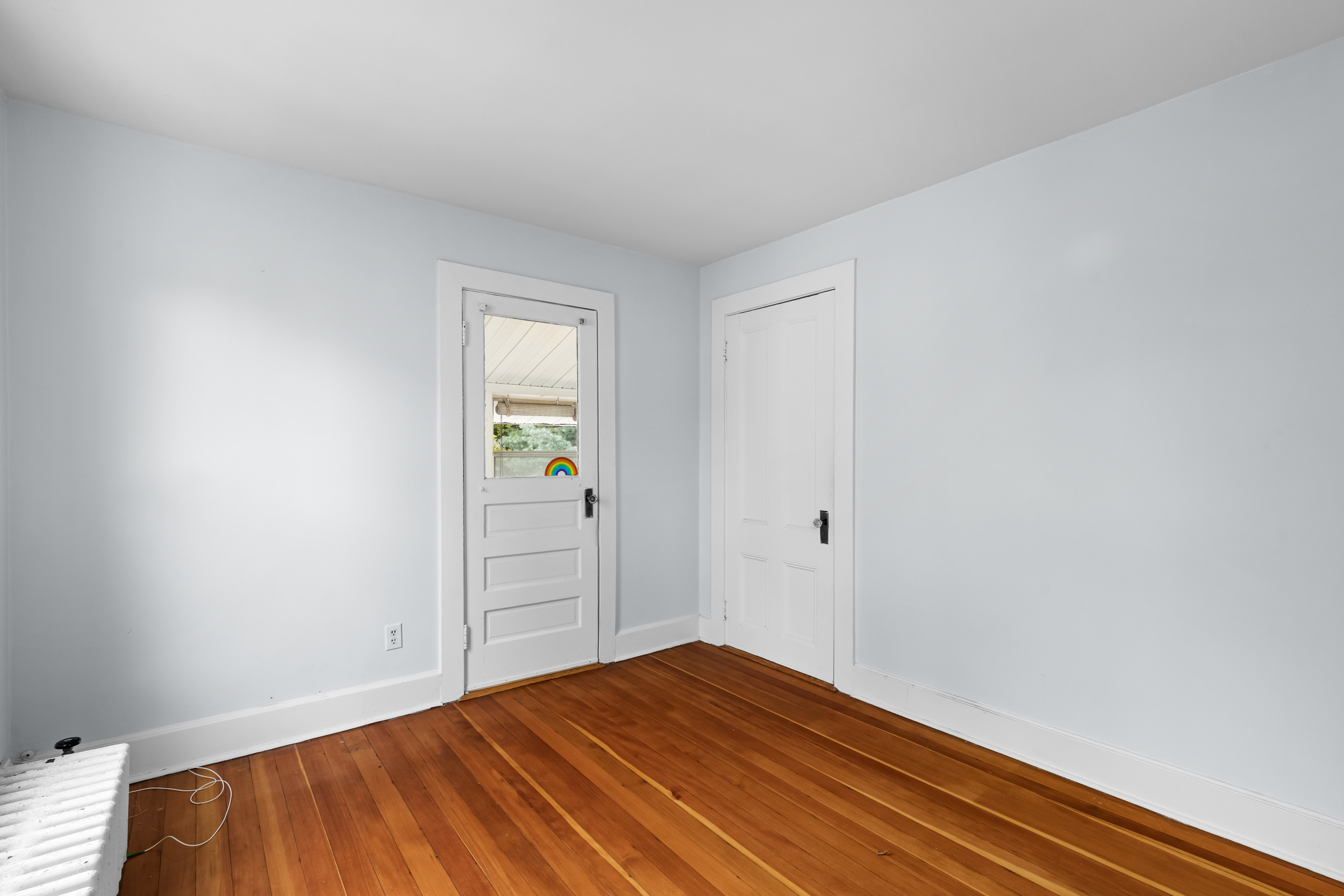 49 Valley Road Stamford, CT 06902 - Photo 23 of 37 a view of empty room with wooden floor