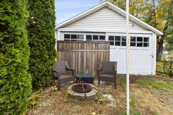 49 Valley Road Stamford, CT 06902 - Photo 32 of 37 a view of a house with backyard and sitting area