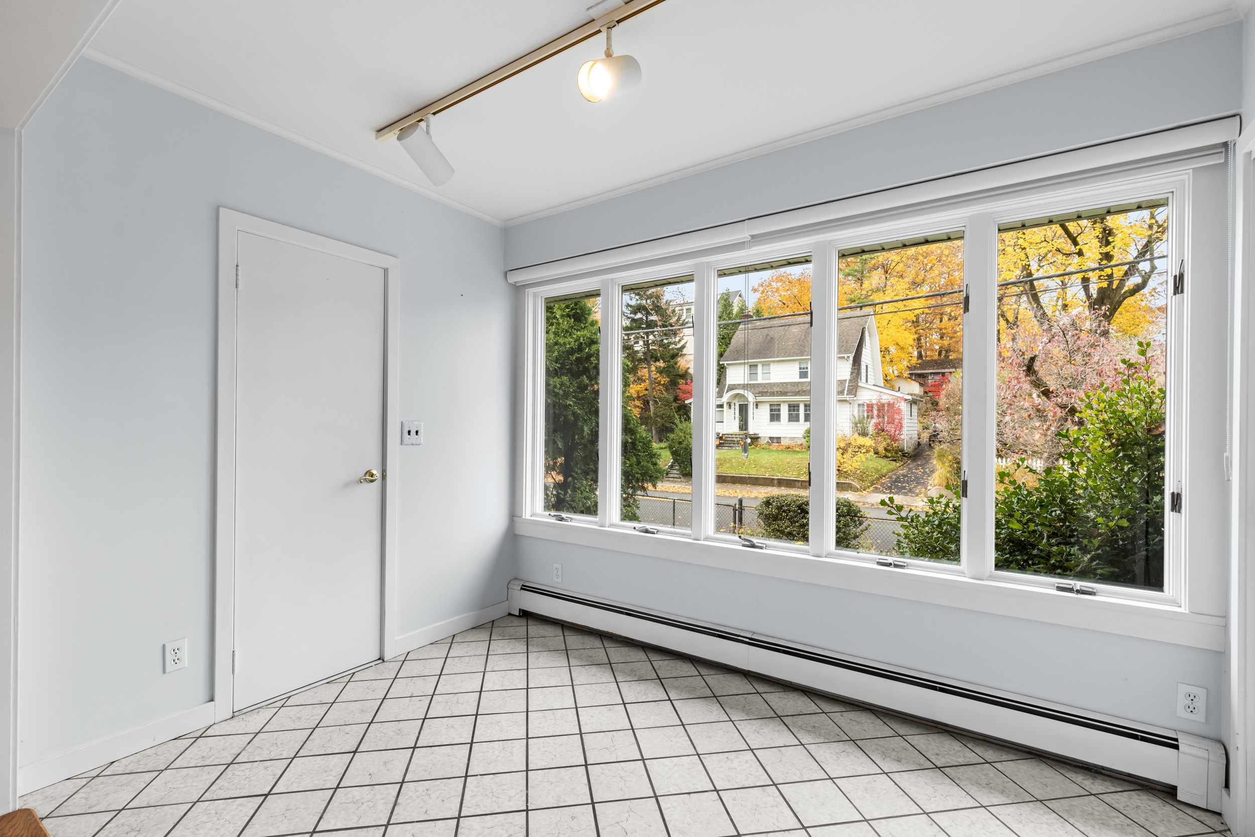 49 Valley Road Stamford, CT 06902 - Photo 7 of 37 a view of an empty room and window