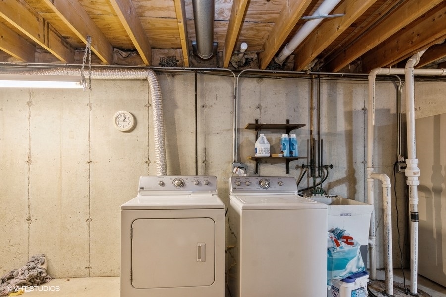 19265 Lange Street Lansing, IL 60438 - Photo 15 of 18 a bathroom with a sink a mirror and shower