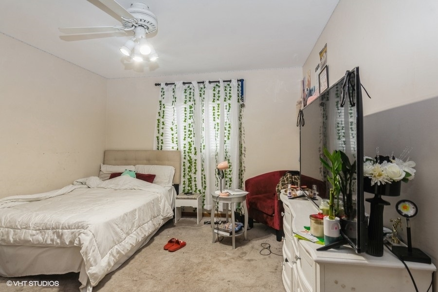 19265 Lange Street Lansing, IL 60438 - Photo 9 of 18 a bedroom with bed and a window