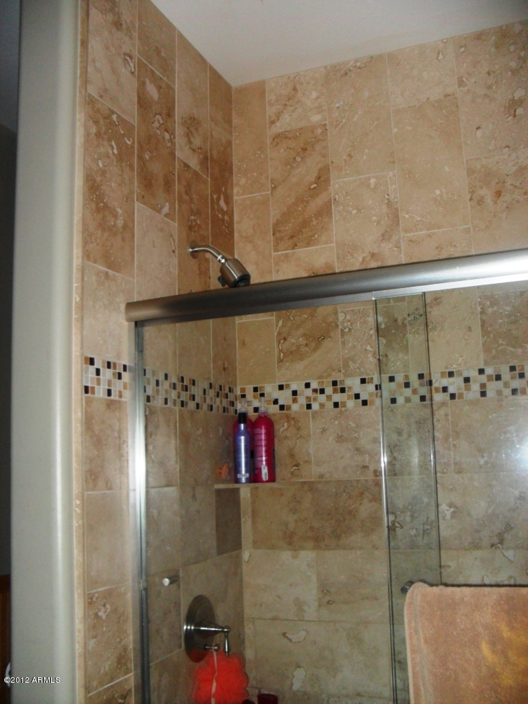 3020 East Ryan Road Gilbert, AZ 85297 - Photo 42 of 69 Travertine tile in bathroom 2 of 1