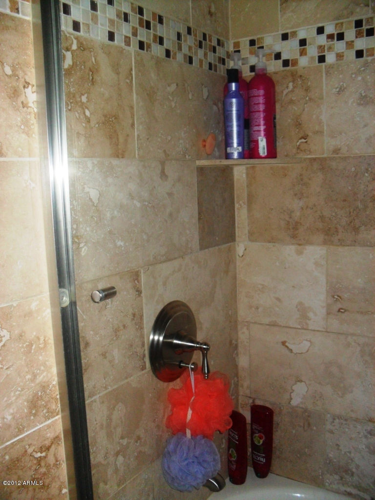 3020 East Ryan Road Gilbert, AZ 85297 - Photo 43 of 69 Travertine tile in bathroom 2