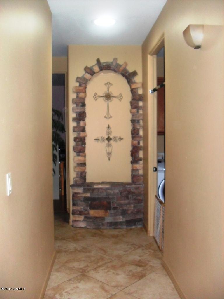 3020 East Ryan Road Gilbert, AZ 85297 - Photo 44 of 69 hallway to bedrooms with stone niche