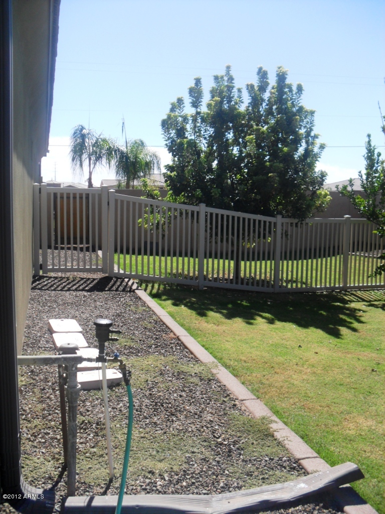 3020 East Ryan Road Gilbert, AZ 85297 - Photo 64 of 69 side yard with single gate entry white v