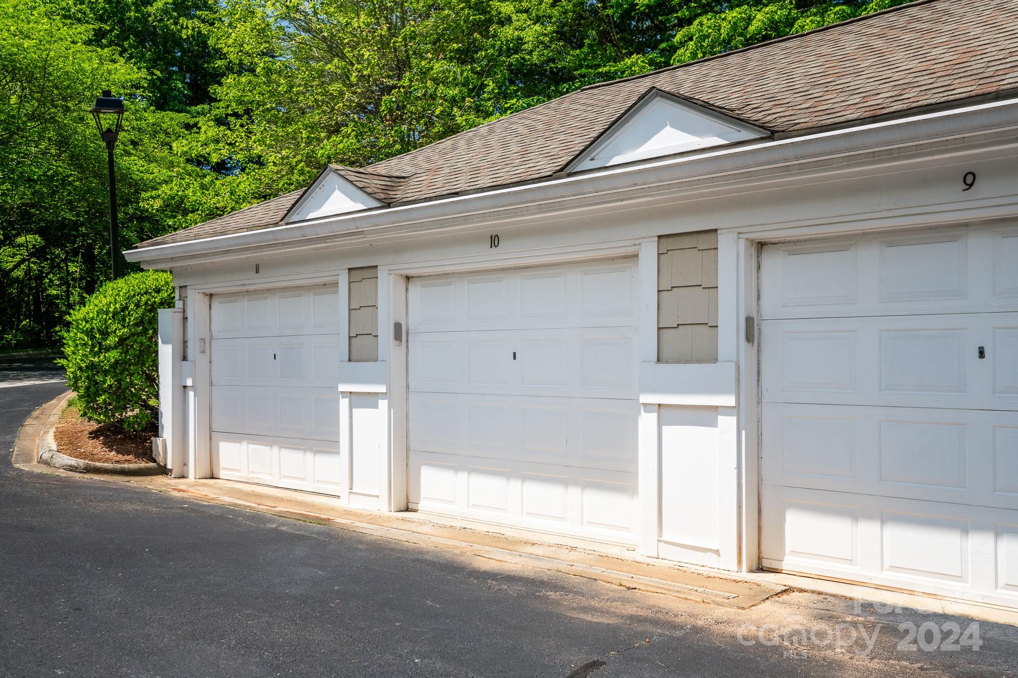 860 Jetton Street, Unit 64 Davidson, NC 28036 - Photo 25 of 33 a view of a house with a garage