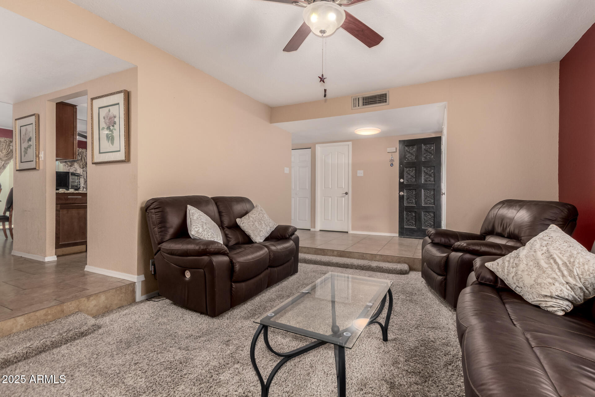 3529 West St Moritz Lane Phoenix, AZ 85053 - Photo 11 of 34 a living room with furniture and a wooden floor