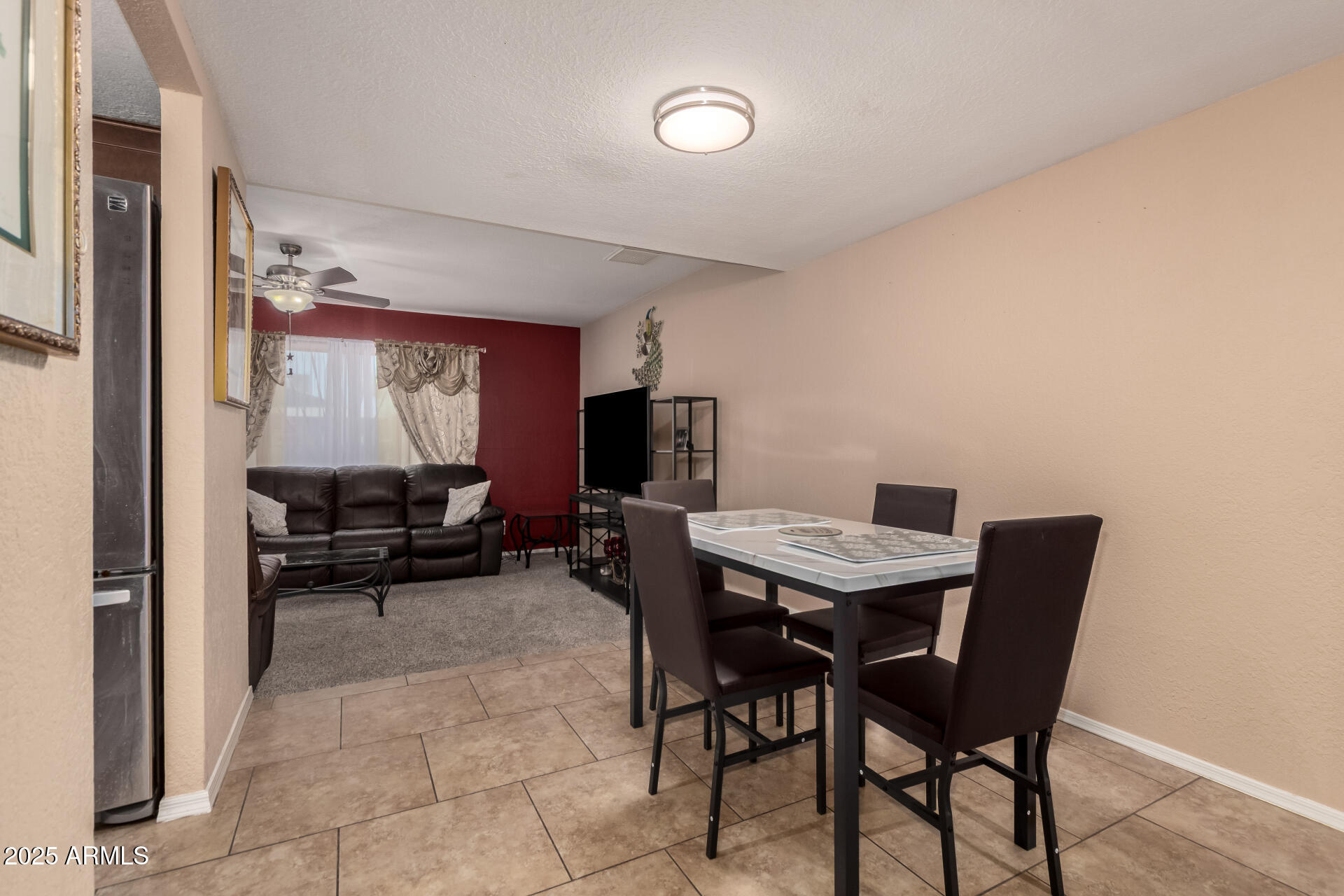 3529 West St Moritz Lane Phoenix, AZ 85053 - Photo 16 of 34 a view of a dining room with furniture
