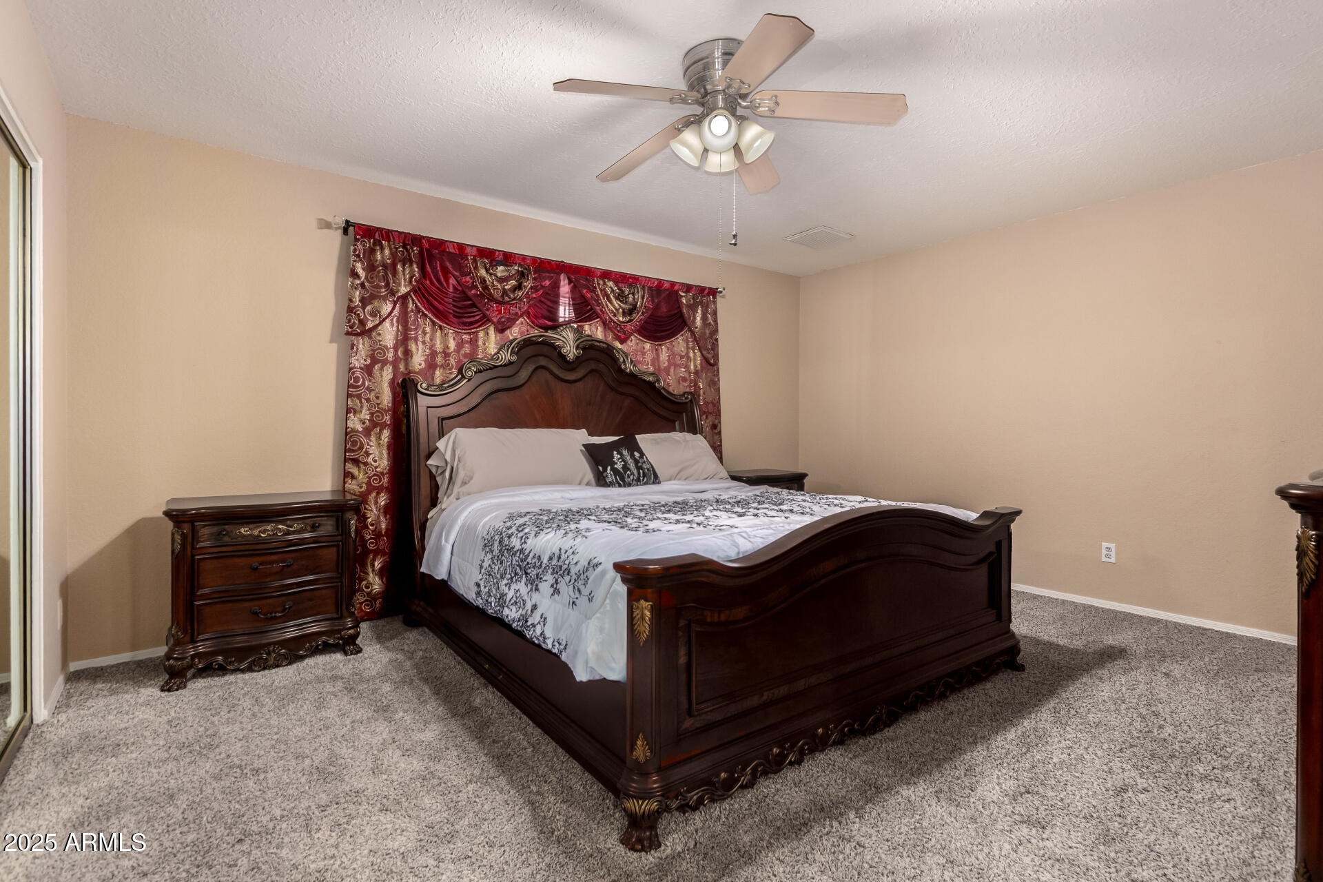 3529 West St Moritz Lane Phoenix, AZ 85053 - Photo 18 of 34 a large bed sitting in a room