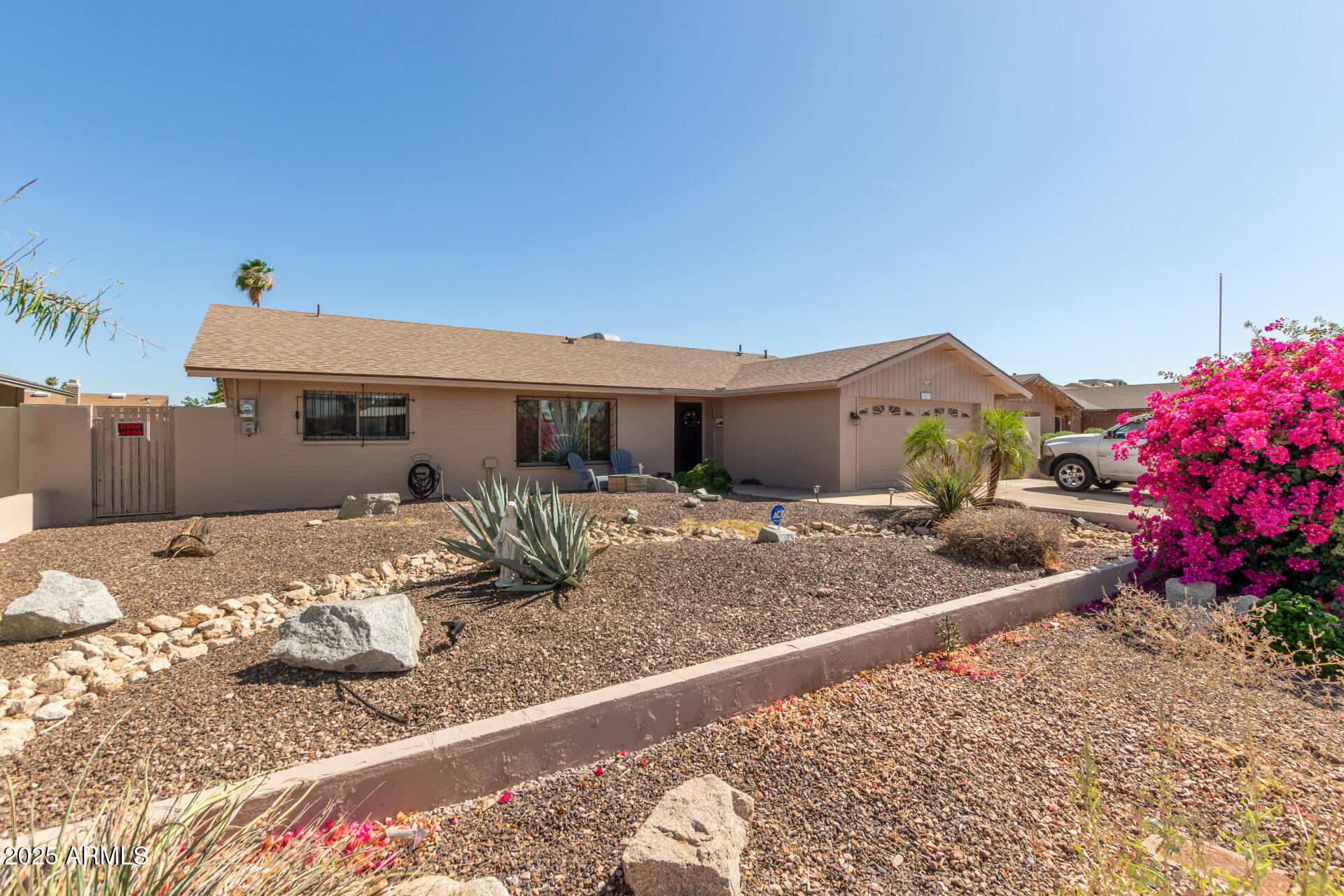 3529 West St Moritz Lane Phoenix, AZ 85053 - Photo 2 of 34 a view of a house with snow on the background