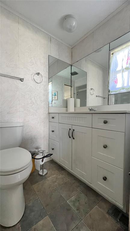 1100 South Belcher Road, Unit 64 Largo, FL 33771 - Photo 23 of 52 a bathroom with a sink toilet and shower