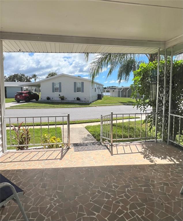 1100 South Belcher Road, Unit 64 Largo, FL 33771 - Photo 24 of 52 a view of a building with a car park in front of it