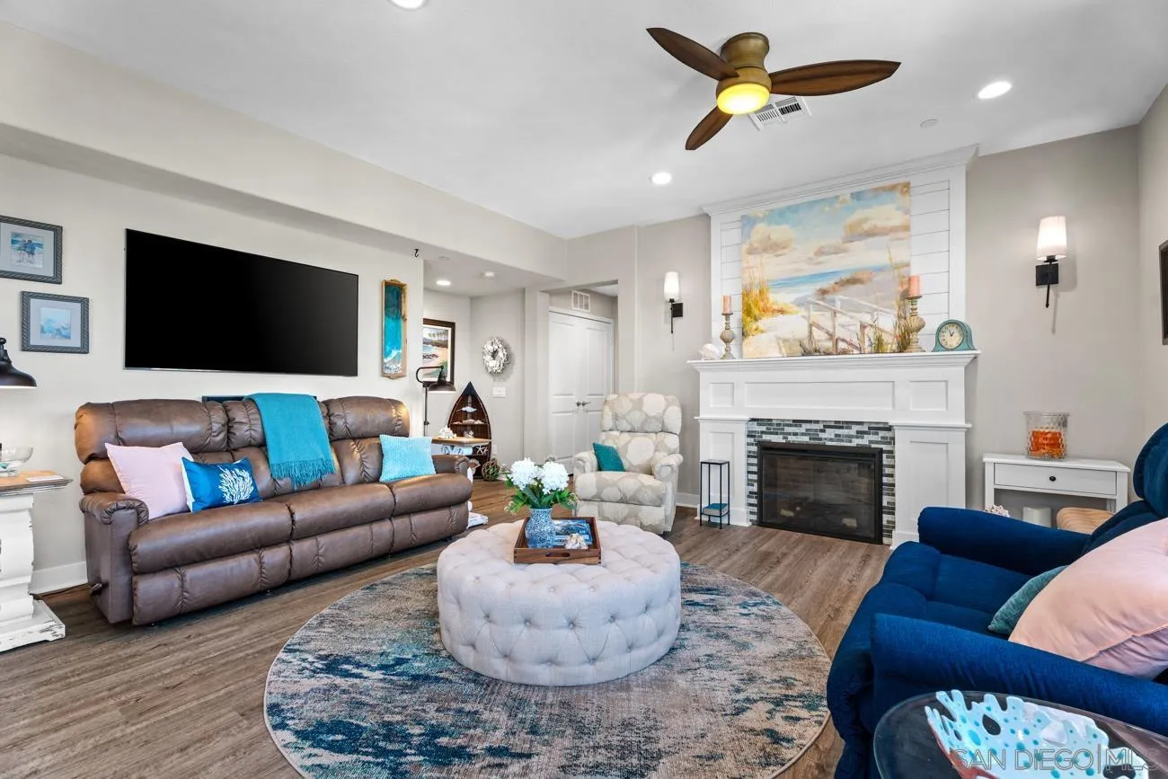 4326 Star Path Way, Unit 1 Oceanside, CA 92056 - Photo 13 of 46 a living room with furniture and a fireplace