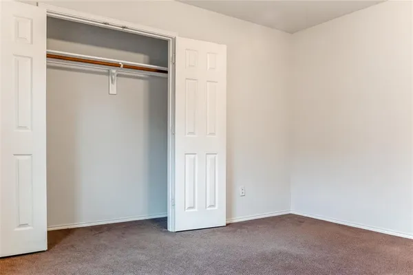 an empty room with a door