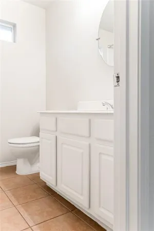 a bathroom with a toilet and a sink