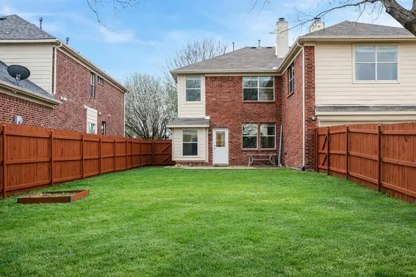a view of backyard with deck