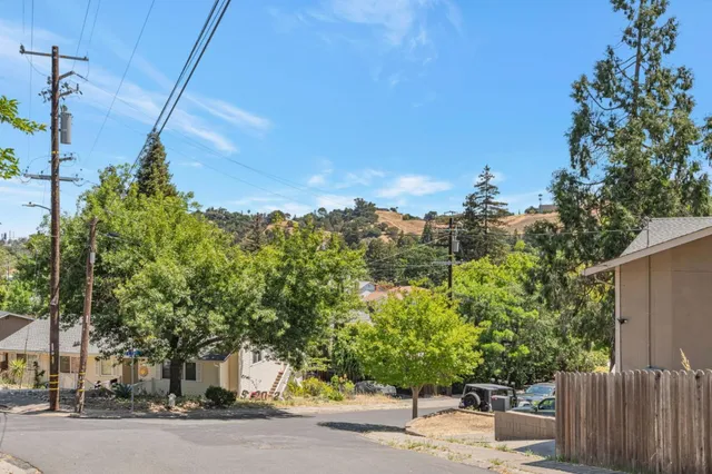 a view of a house with a street