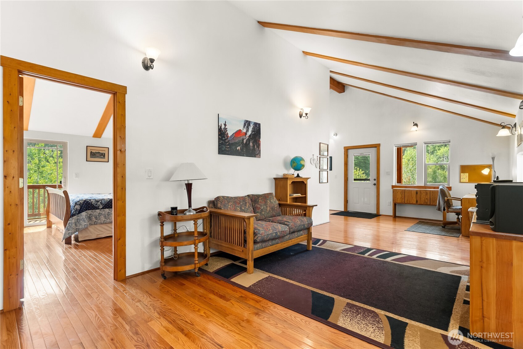 96 Alder Creek Road Twisp, WA 98856 - Photo 20 of 40 a living room with furniture and a flat screen tv