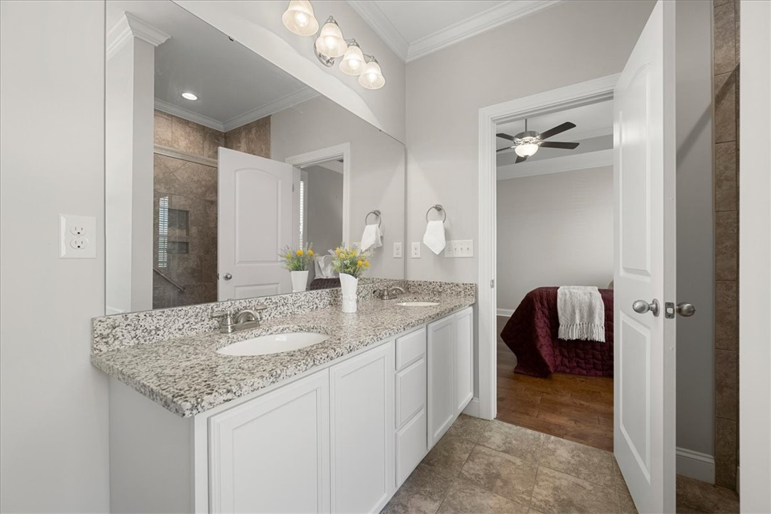 21 Barron Glenn Way Anderson, SC 29621 - Photo 33 of 48 This spacious Primary Bathroom features a double vanity with granite counters and a walk-in shower.