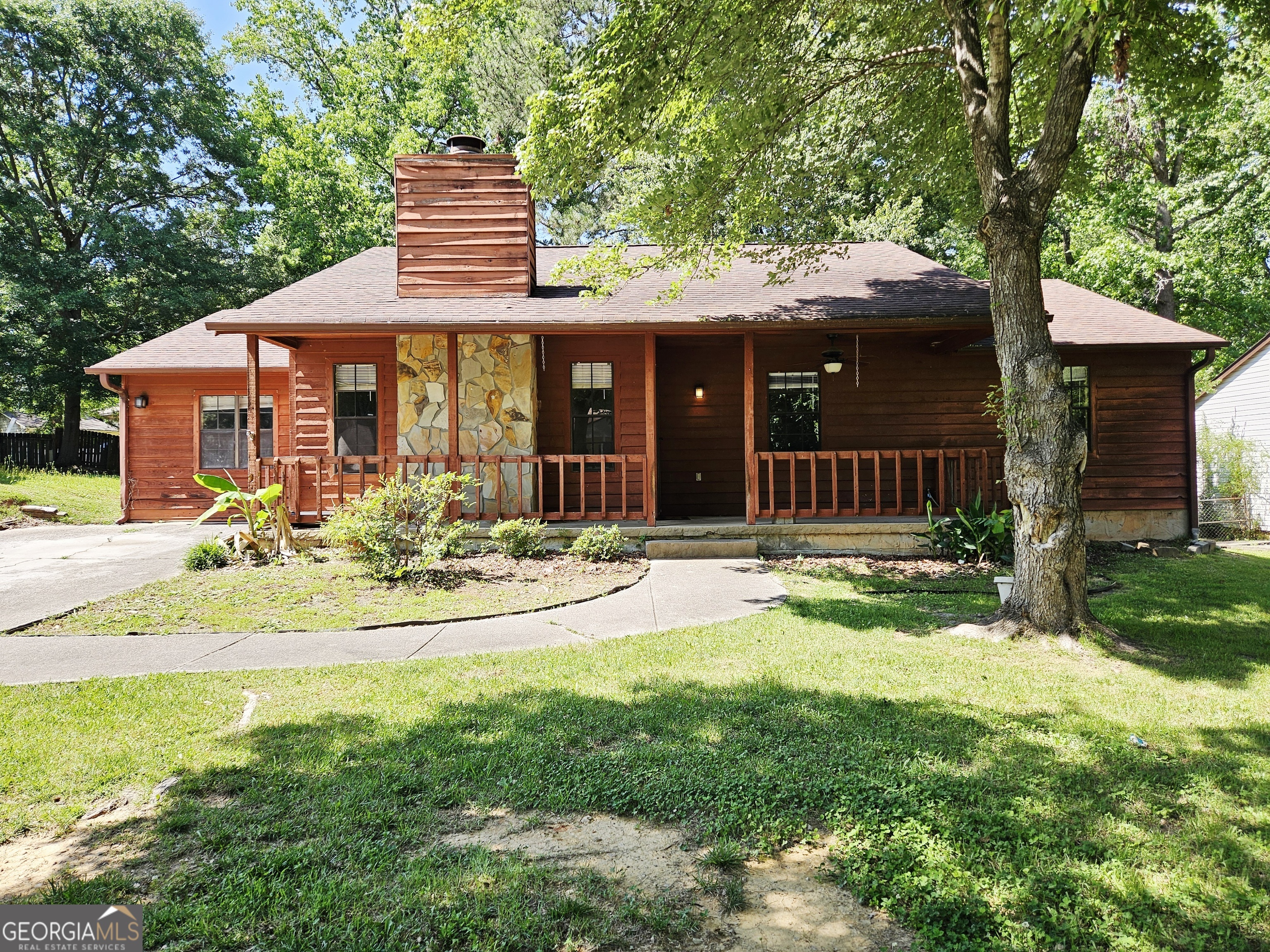 6698 Cameron Road Morrow, GA 30260 - Photo 1 of 1 a front view of a house with a yard