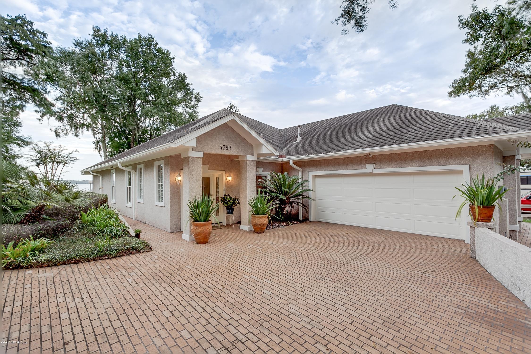 4397 Cedar Road Orange Park, FL 32065 - Photo 26 of 28 a view of a house with a patio