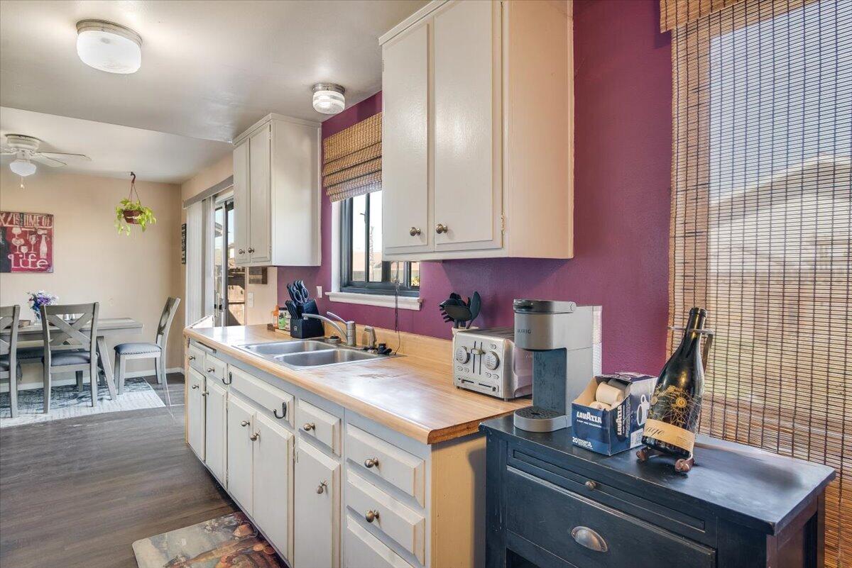 1601 Barrington Court Lompoc, CA 93436 - Photo 15 of 26 a kitchen with sink cabinets and stove