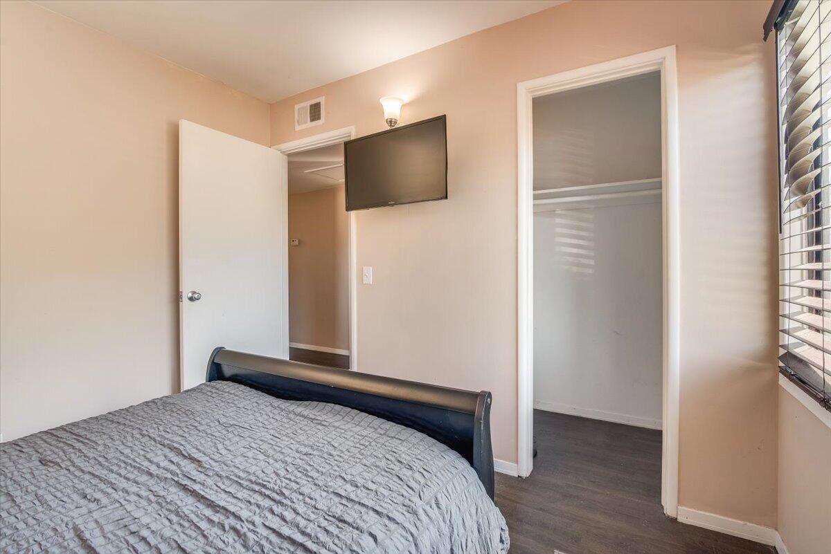 1601 Barrington Court Lompoc, CA 93436 - Photo 24 of 26 a bedroom with a bed and a flat screen tv