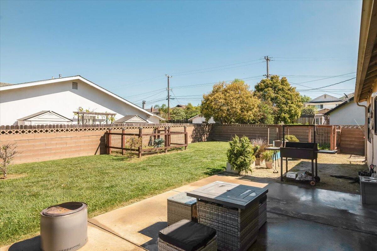 1601 Barrington Court Lompoc, CA 93436 - Photo 5 of 26 a view of a porch with furniture and garden