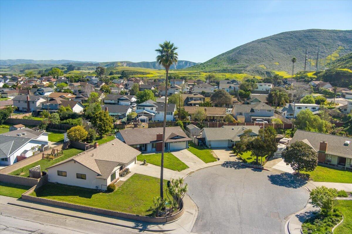 1601 Barrington Court Lompoc, CA 93436 - Photo 8 of 26 an aerial view of residential houses with outdoor space and swimming pool