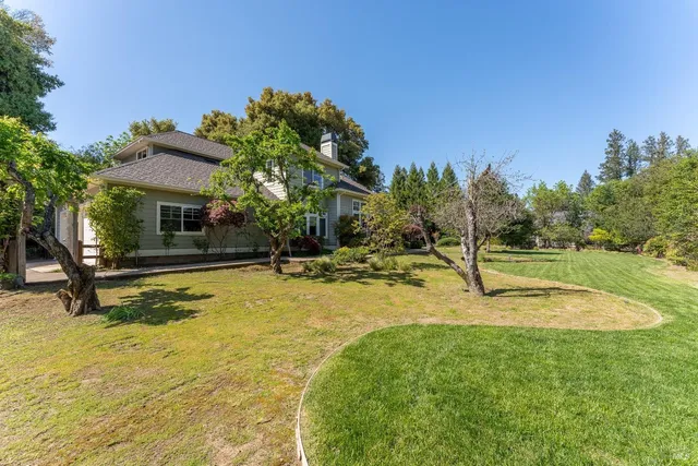 a view of a house with swimming pool
