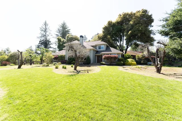 a view of a swimming pool with an outdoor space and seating area