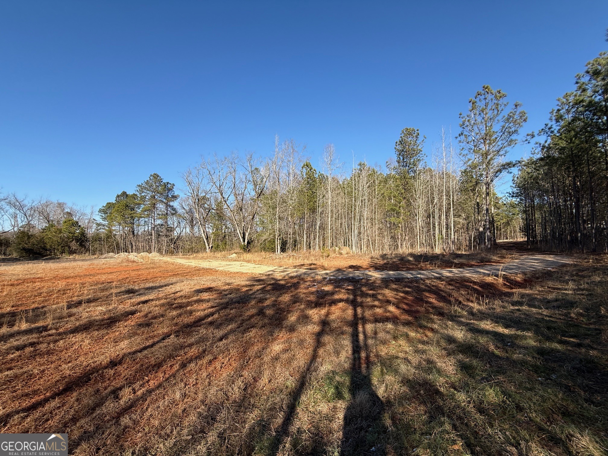 641 Dennis Station Road Southwest Eatonton, GA 31024 - Photo 5 of 13 a view of dirt yard and mountain view