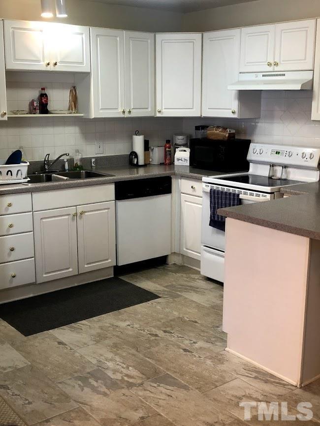 510 Locke Lane Raleigh, NC 27610 - Photo 12 of 23 Tile Flooring throughout kitchen