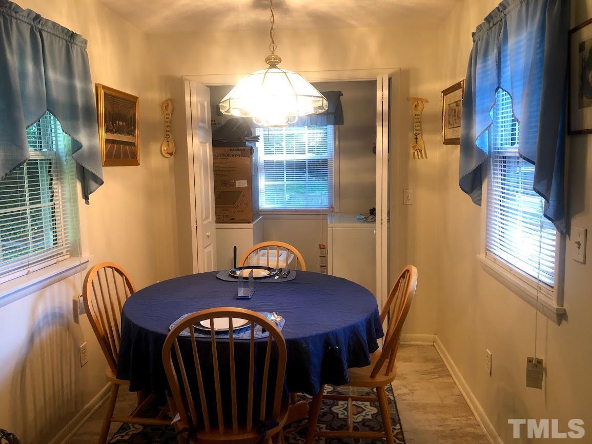 510 Locke Lane Raleigh, NC 27610 - Photo 13 of 23 Dining Room area and Laundry Utility Room