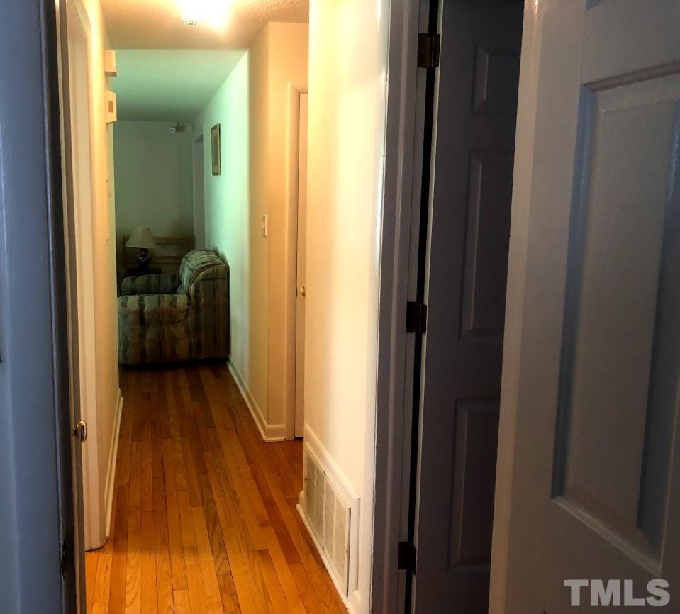 510 Locke Lane Raleigh, NC 27610 - Photo 15 of 23 Hallway from Bedrooms