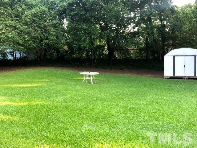 510 Locke Lane Raleigh, NC 27610 - Photo 21 of 23 Backyard with 8 x 10 Storage Unit