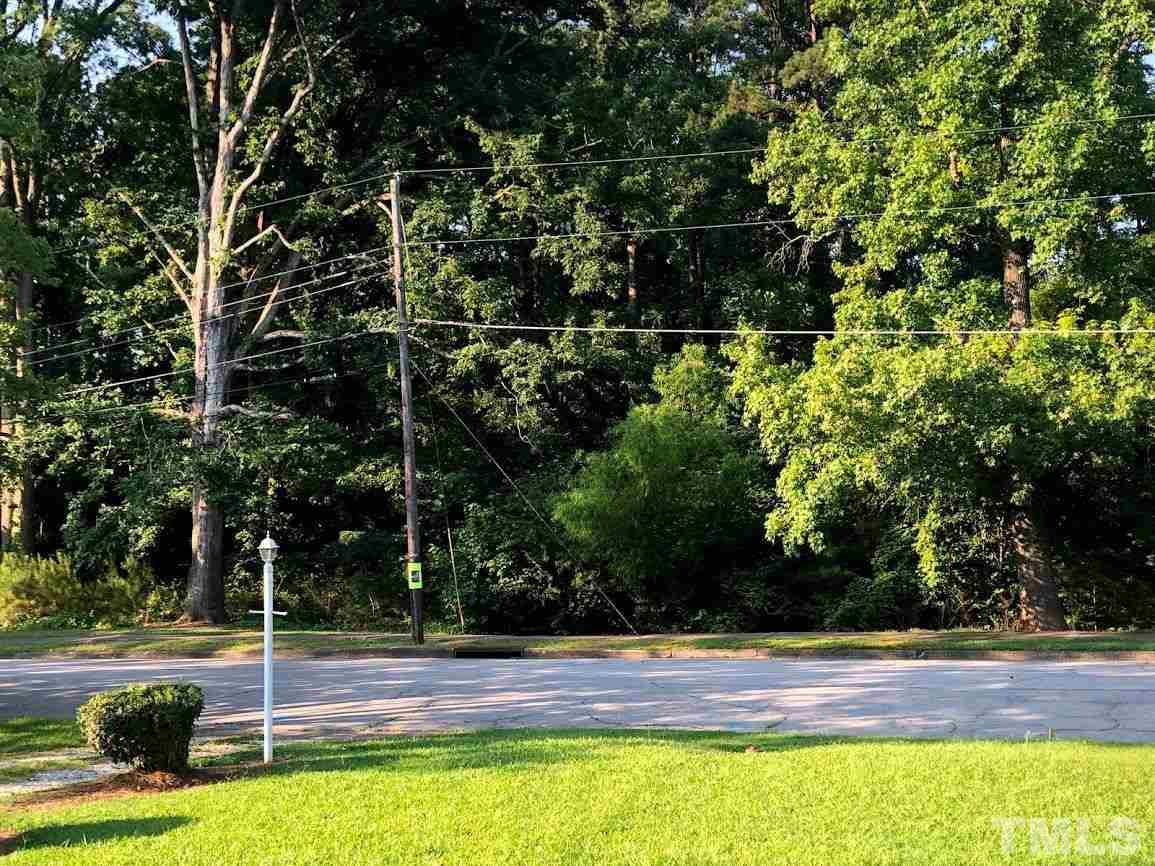 510 Locke Lane Raleigh, NC 27610 - Photo 4 of 23 Lovely view of natural area and sidewalk from front porch.