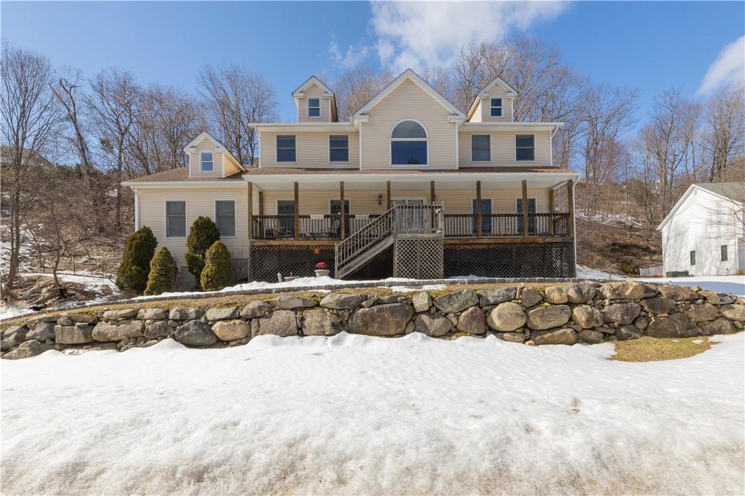 40 South Ridge Road Pomona, NY 10970 - Photo 1 of 1 a front view of a house with a yard covered in snow